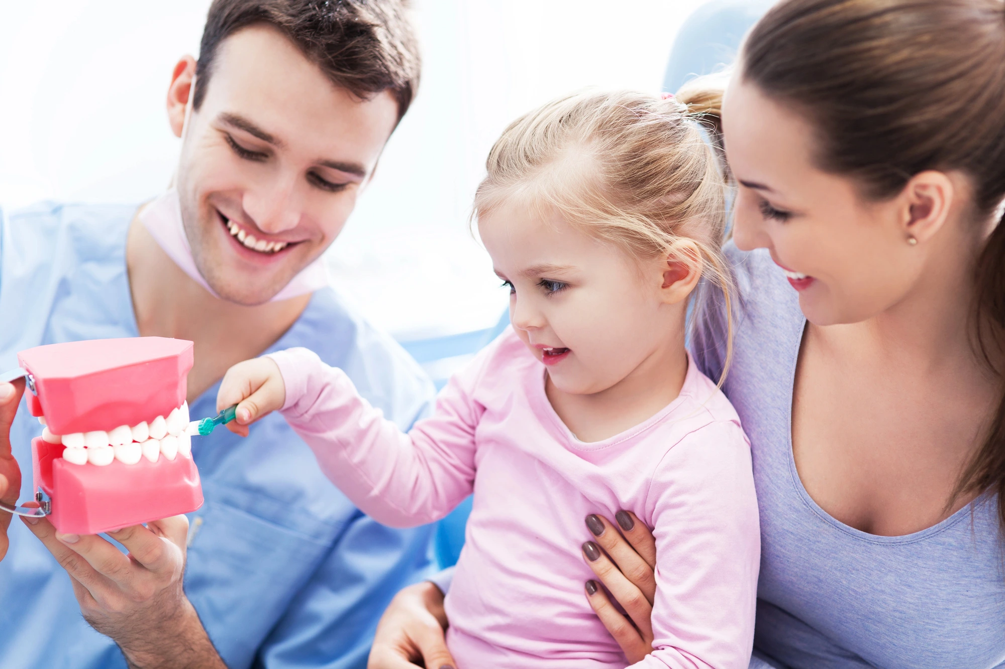 little girl learning about teeth at a Loudoun County dentist